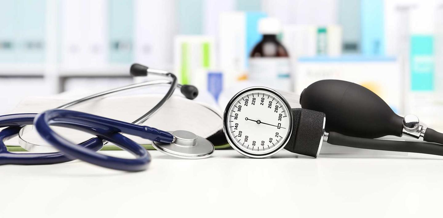 Desk with stethoscope and clinic tenometer