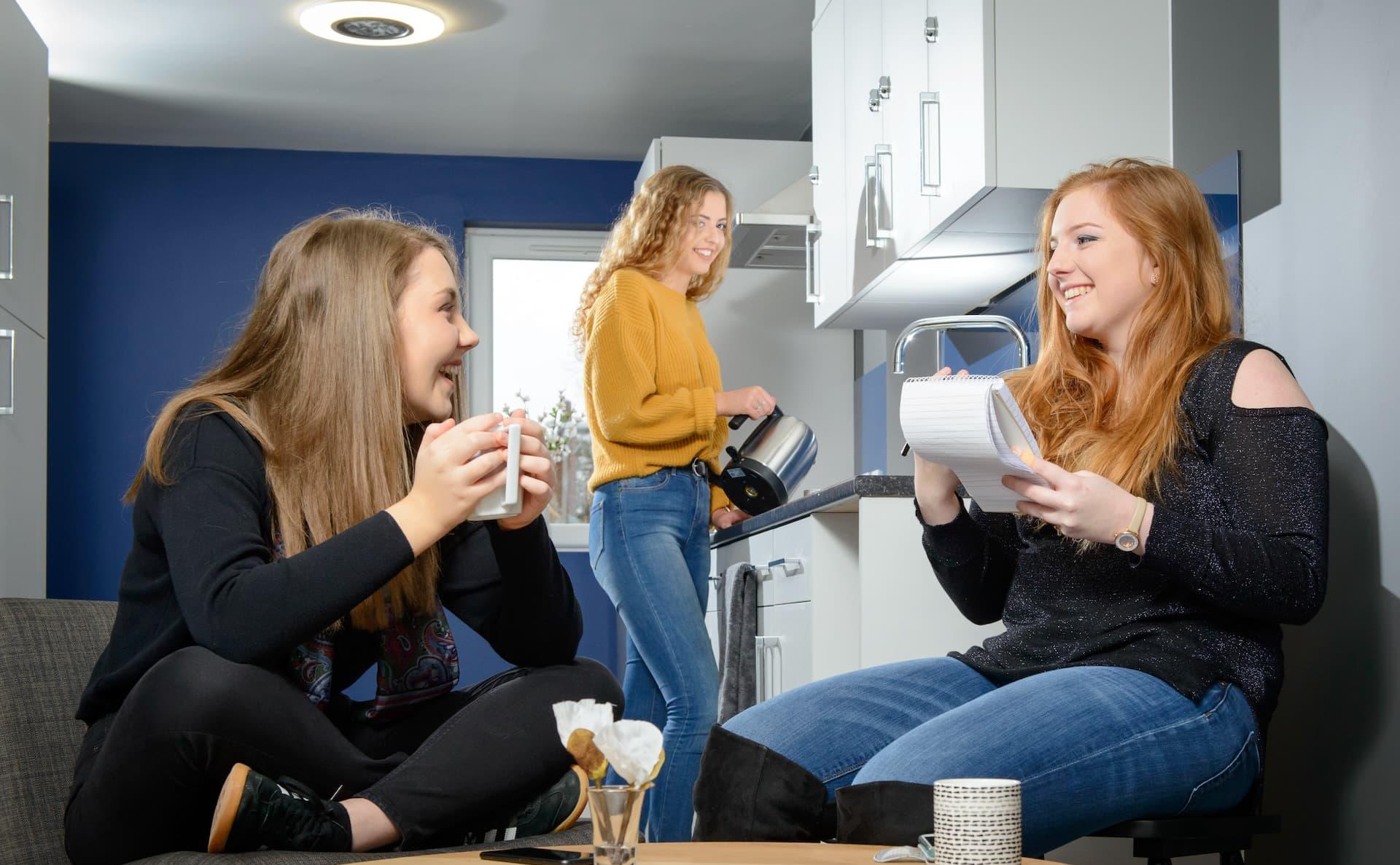 Students in the kitchen of Westfield Court, student accommodation in Hull