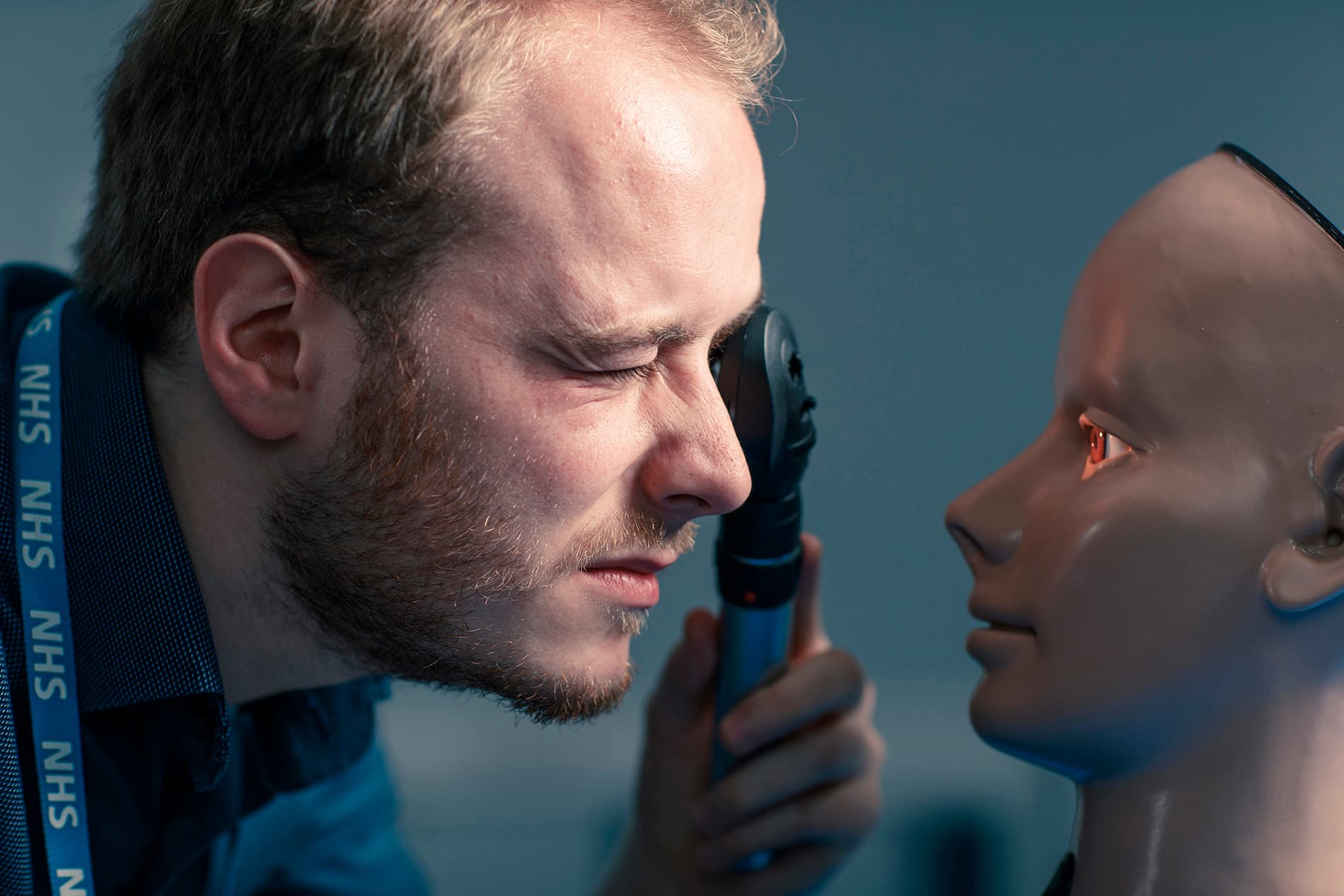 Medical student practising ophthalmology