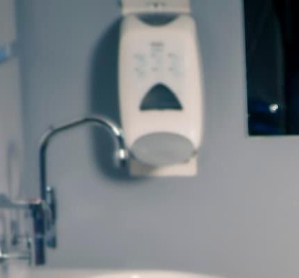 Medical student with patient a GP surgery, being supervised by a GP