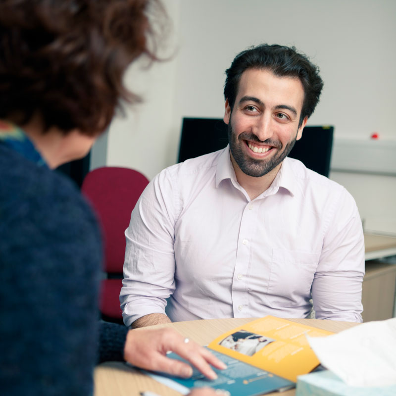 Student talking to a member of the Student Support Team