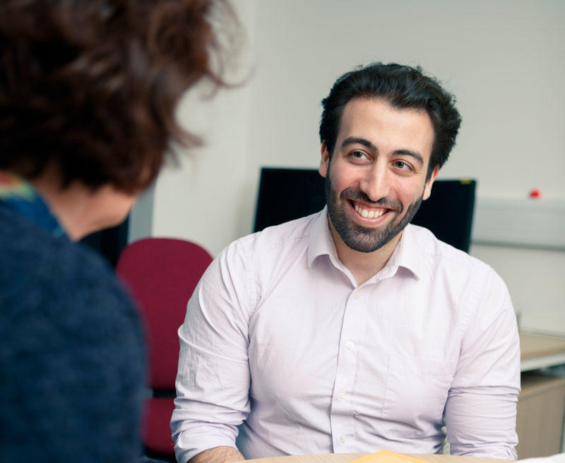 Student talking to a member of the Student Support Team