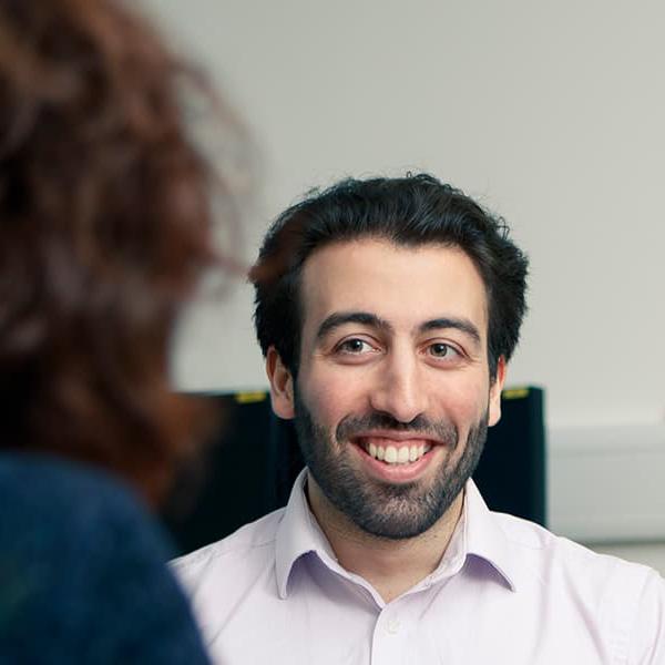 Students talking to a member of the Student Support Team