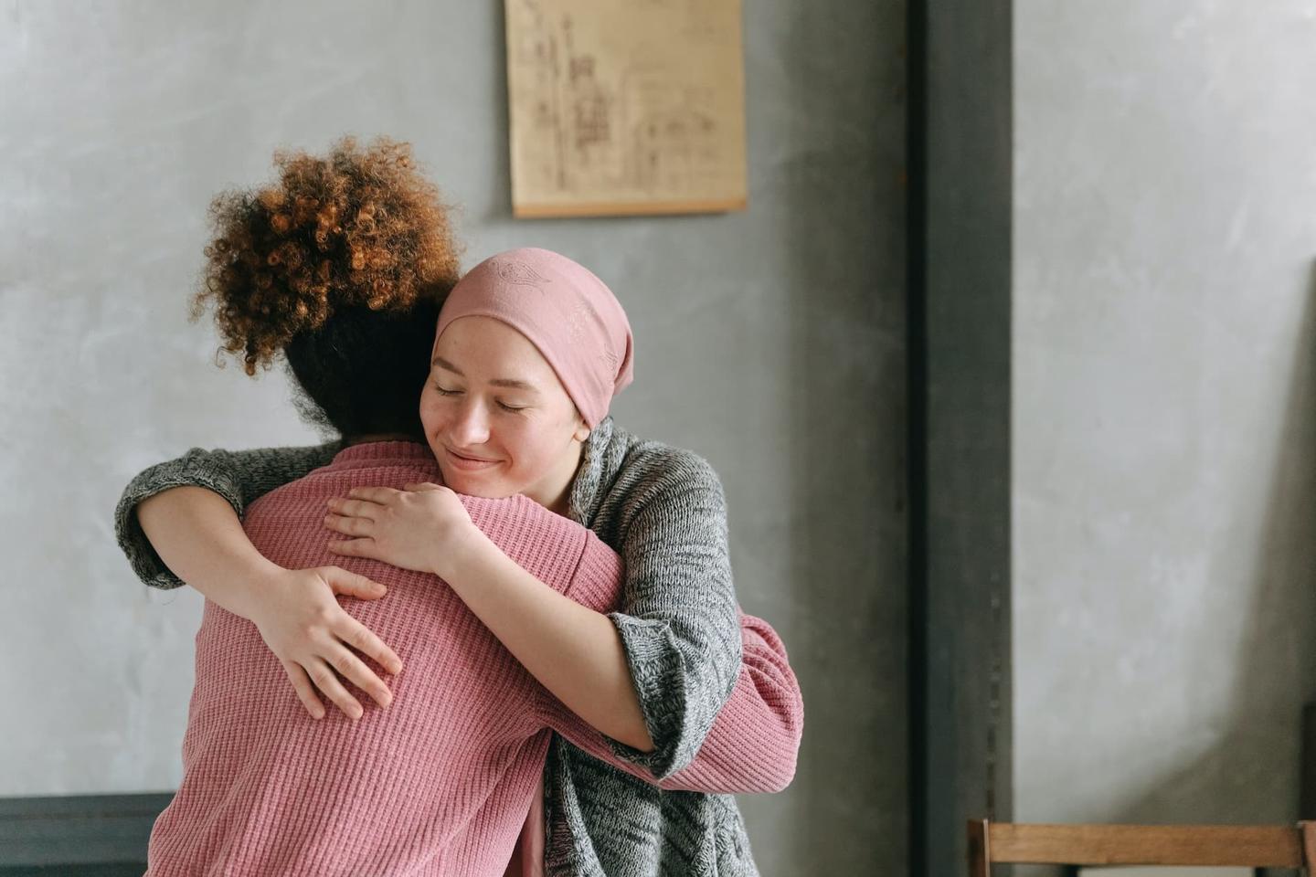 Two women hugging