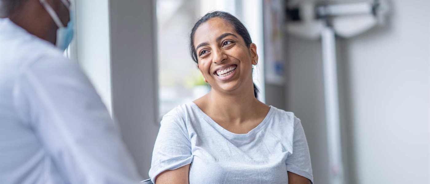Smiling patient with doctor