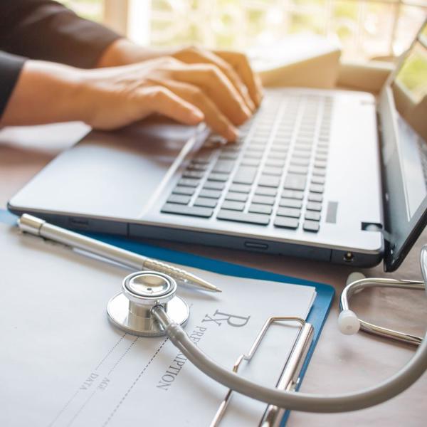 doctor working on laptop computer