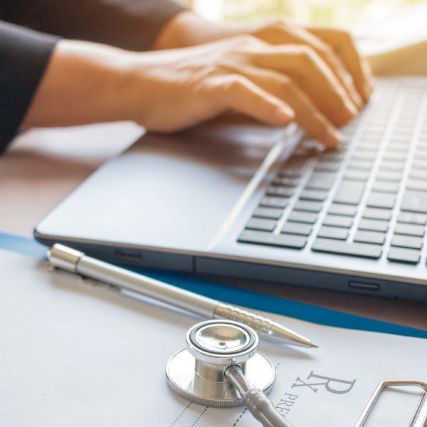 Doctor working on a laptop computer